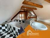 Schlafzimmer mit Badewanne - 