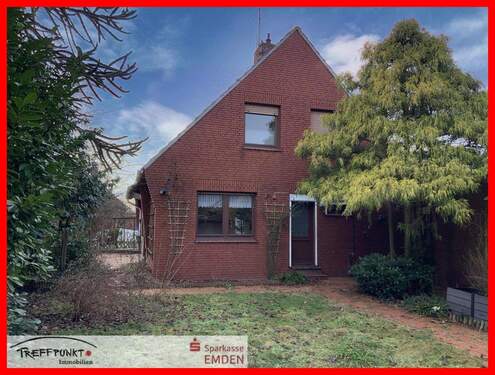 Rückansicht mit Zugang zum Garten - 4 Zimmer Einfamilienhaus in Hinte