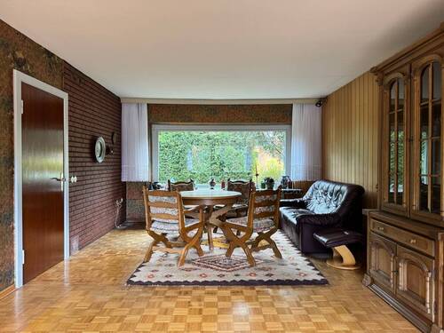 Wohnzimmer - 4 Zimmer Einfamilienhaus zum Kaufen in Ellerau