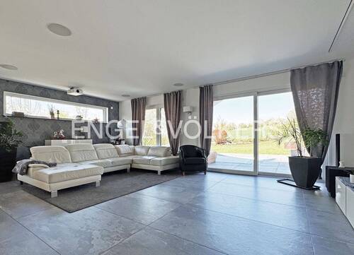 Wohnbereich mit Zugang zur Nord-West-Terrasse - 