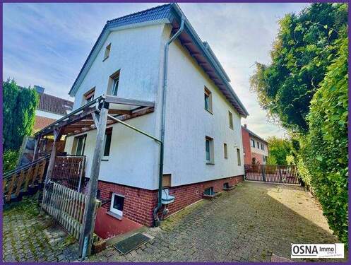 Haus Gartenansicht - 8 Zimmer Mehrfamilienhaus, Wohnhaus in Melle