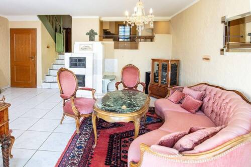 Wohnzimmer mit Kachelofen - 
