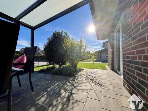 Garten mit überdachter Terrasse - 