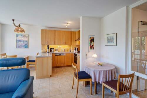 Wohnzimmer mit offener Küche - 3 Zimmer Etagenwohnung zum Kaufen in Zorneding