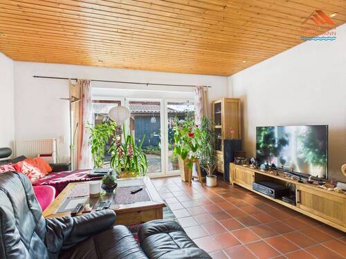 EG - Wohnzimmer 1 - 6 Zimmer Mehrfamilienhaus, Wohnhaus in Drangstedt