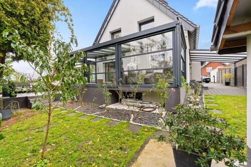 9. Rückseite Haus und Wintergartenjpg - 