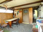 Überdachte Terrasse (hinten Abstellraum und Garage) - 
