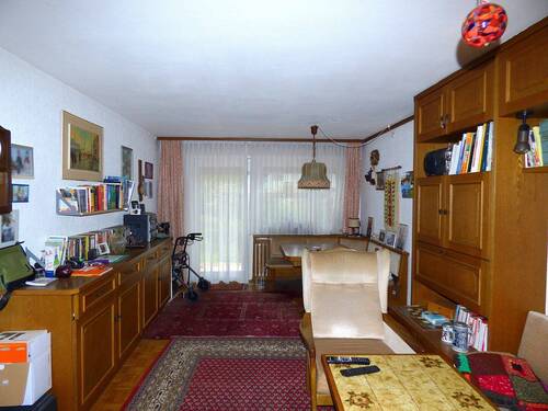 Wohnzimmer mit Zugang zur Terrasse - 