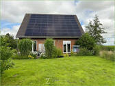Ansicht mit PV-Anlage - 