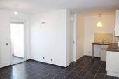 Wohnzimmer mit offener Küche.JPG - 3 Zimmer Etagenwohnung in Viernheim