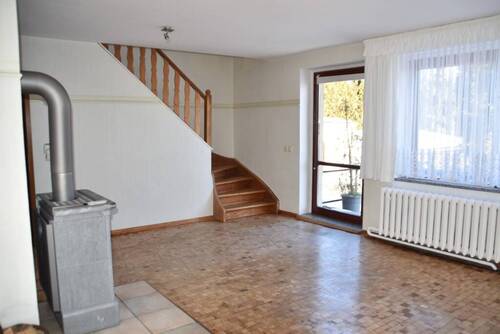 Wohnzimmer mit Kaminofen - 