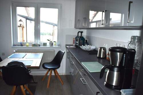 Küche mit Blick in den Garten - 