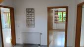Flur mit Gang zu Zimmer 1 - 