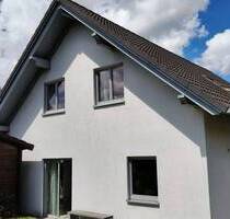 Familienfreundliches Einfamilienhaus mit großer Küche, Gartenhütte und Doppelcarport in Oelkassen - Lüerdissen / Oelkassen