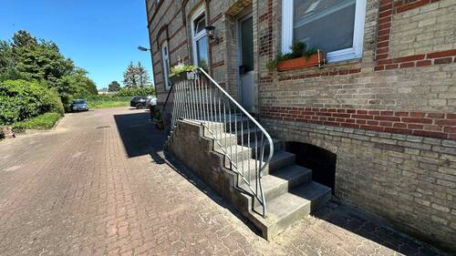 Hauseingang - 1 Zimmer Mehrfamilienhaus, Wohnhaus in Uetersen
