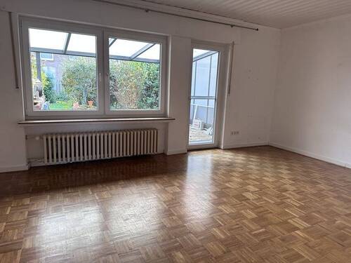 Wohnzimmer - Einfamilienhaus mit 115,40 m² in Bramsche zum Kaufen