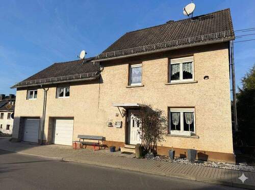 Bild 2 - 7 Zimmer Einfamilienhaus zum Kaufen in Woldert