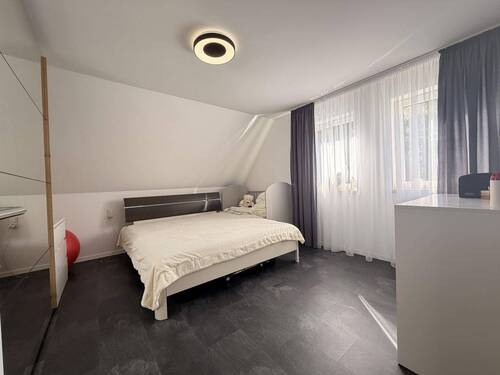 Schlafzimmer 2 im Dachgeschoss - 