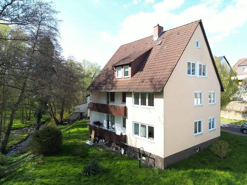 Rückansicht - 9 Zimmer Mehrfamilienhaus, Wohnhaus zum Kaufen in Baunatal