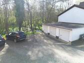 Garagen - 9 Zimmer Mehrfamilienhaus, Wohnhaus in Baunatal