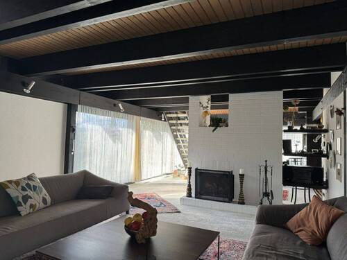 Wohnbereich mit offenem Kamin - 