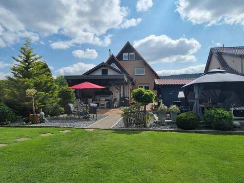 Rückansicht - Mehrfamilienhaus, Wohnhaus mit 310,00 m&sup2; in Hille zum Kaufen