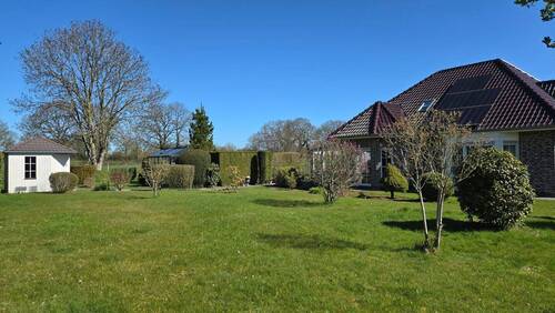 Blick in den Garten - Bungalow mit 156,00 m&sup2; in Filsum zum Kaufen