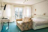 Schlafzimmer mit Balkon - 