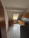 Küche mit Blick aus dem Flur - Etagenwohnung mit 55,40 m&sup2; in Berlin zum Kaufen