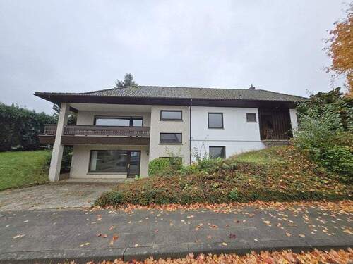 Vorderansicht - Großzügiges Wohnhaus mit gewerblicher Fläche in Hille-Oberlübbe