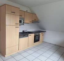 Lichtdurchflutete 2-Zi Dachgeschoßwohnung renoviert mit Gartennutzung in Satrup - Mittelangeln