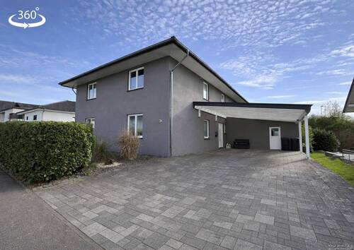 SP-25-CSBD-413 - Modernes Zweifamilienhaus mit Carport, Terrasse und Garten