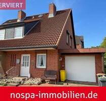 Teilweise unterkellertes Reihenendhaus mit Garage und Terrasse im beliebten Stadtteil Rödemis - Husum