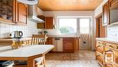 Küche mit Zugang in den Garten - 3 Zimmer Einfamilienhaus in Klein Gladebrügge