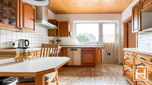 Küche mit Zugang in den Garten - 3 Zimmer Einfamilienhaus in Klein Gladebrügge