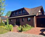 Seitliche Vorderansicht - Modernes Ein- Zweifamilienhaus in ruhiger Lage im Ahlener Westen