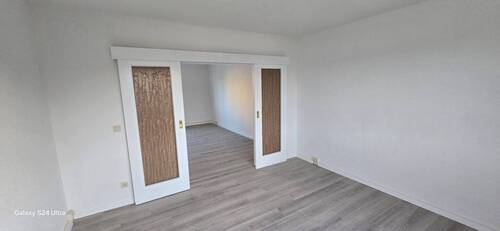Blick auf das Schlafzimmer einer Wohnung im 1.OG - 