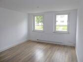 Wohnzimmer einer Wohnung im EG - 