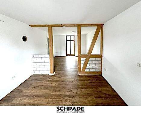 Das Wohnzimmer mit Terrassenzugang - 2 Zimmer Etagenwohnung zur Miete in Seehausen