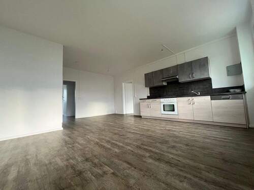 Wohnzimmer mit Einbauküche - Mehr Raum fürs Familienleben: Einziehen, Ankommen & Wohlfühlen mit Einbauküche