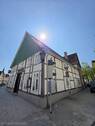Seitenansicht - Mehrfamilienhaus, Wohnhaus zum Kaufen in Rietberg