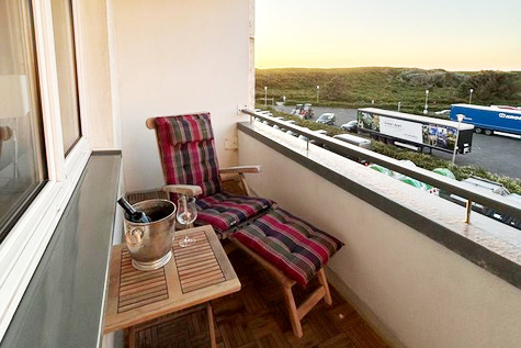 Loggia bei Sonnenuntergang - NEU ! Exklusives Appartement direkt am Strandübergang !
