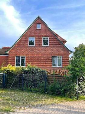 Gartenseite - Mehrfamilienhaus, Wohnhaus mit 178,00 m&sup2; in Wedemark zum Kaufen