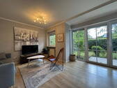 Wohnzimmer - Helle 2-Zimmer-Wohnung mit Terrasse, Garten und Garage in sehr ruhiger Lage