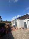 Garage und Frontansicht - 3 Zimmer Einfamilienhaus zum Kaufen in Wolfhagen