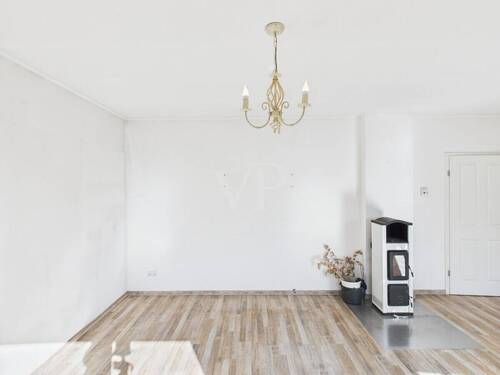 Wohnzimmer EG mit Kamin - 