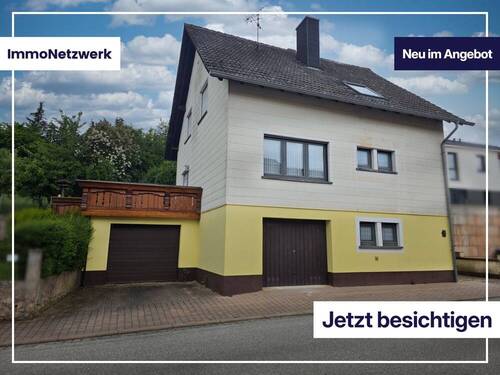 Titelbild - 1-Familienhaus mit Ausbaupotenzial: Garten, Südterrasse, 2 Garagen & optionale 2. Wohneinheit