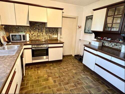 Einbauküche - Mehrfamilienhaus, Wohnhaus mit 210,00 m&sup2; in Drage zum Kaufen