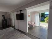 Wohnzimmer mit Eingangsbereich - 