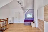 Schlafbereich im Dachgeschoss - 